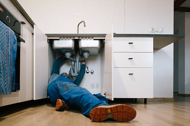 Professional Emergency Plumber technician working in Lancaster, WI